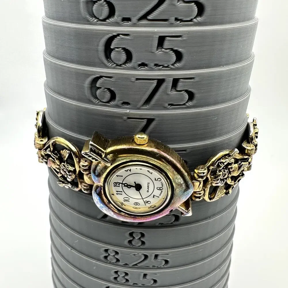 Cherub Charm Bracelet Watch Quartz Faded Gold Tone Analog